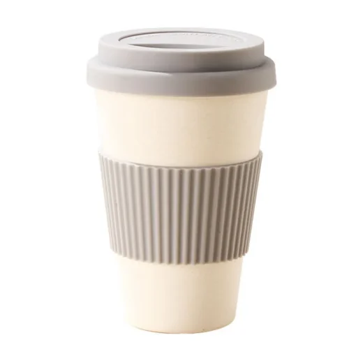 Eco-friendly bamboo fiber coffee cup with silicone lid and protective sleeve for office use
