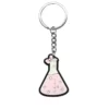 Science lab reagent bottle keychain used as a cute school bag decoration