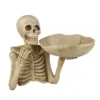 Close-up of detailed skull-shaped storage tray for holding keys and small accessories
